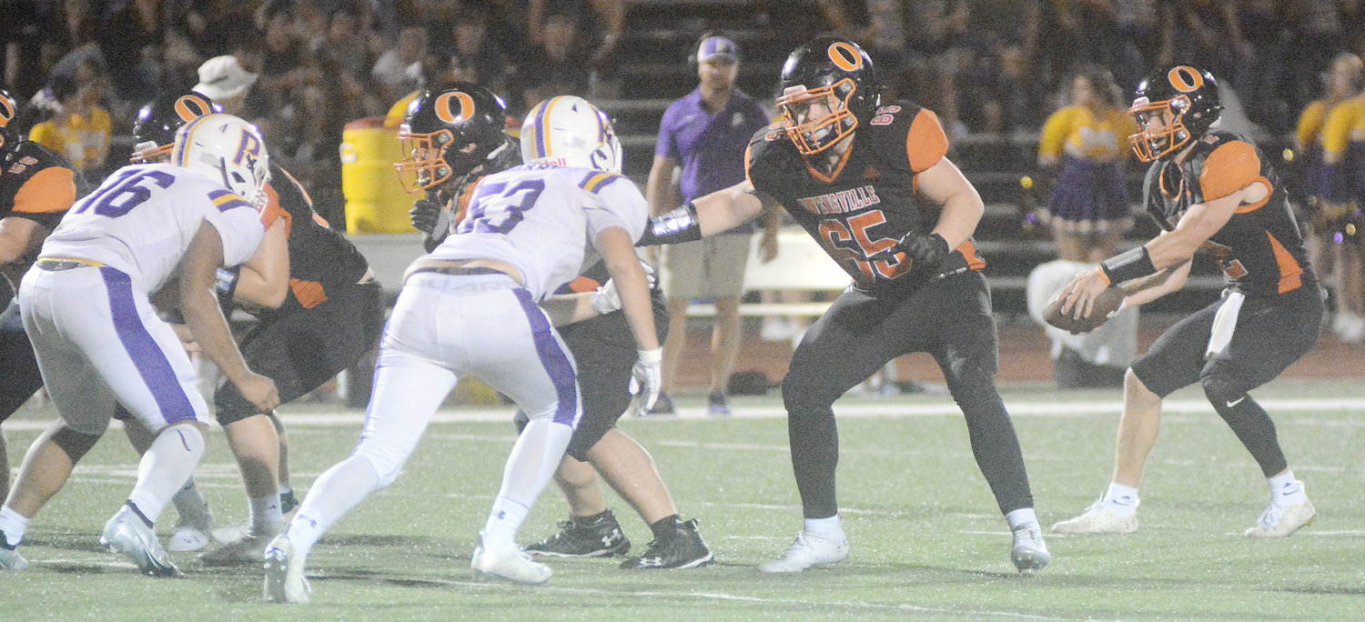 Chance Clevenger (third from left) gets in position to protect Dutchmen senior quarterback Brendan Decker (far right) during Owensville’s season-opening 38-34 come-from behind victory over the visiting Potosi Trojans.